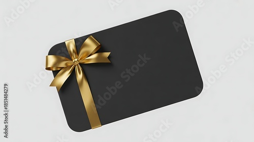Blank black gift card mockup with elegant gold ribbon and bow on light gray