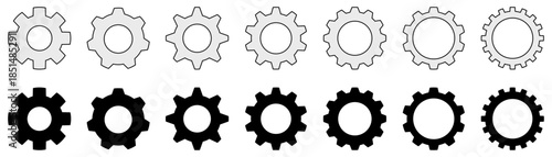 Collection of black and white cogwheels and gears in various sizes, representing mechanics and industry