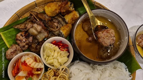 Bun Cha Vietnamese soup noodle  with caramalized grilled pork slow