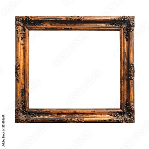 Ornate antique wooden picture frame with distressed finish against a black background.