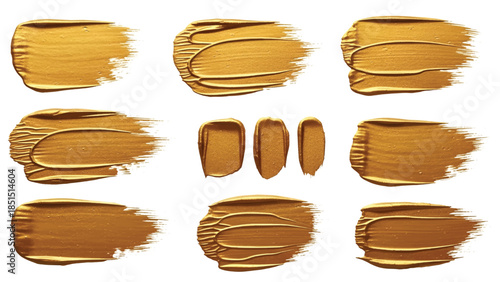 Array of twelve golden paint brush strokes and smears on white background showing rich texture. glow