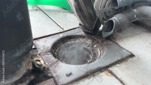 Smoke from drainage sewage pipe close up shot.