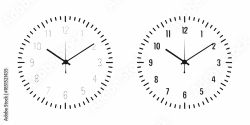 Two analog wall clocks showing different times isolated on a white background