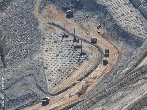 Obraz na płótnie drilling process for mass blasting in an open pit mine