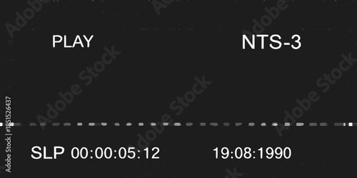 Vintage play button and timestamp display on a dark screen