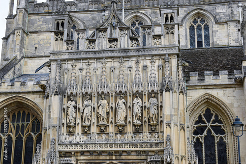 Fototapeta View of allegorical carvings in stone for building facades with Gothic architect