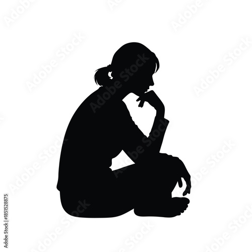 Black silhouette of a woman sitting with chin resting on hand female contemplation