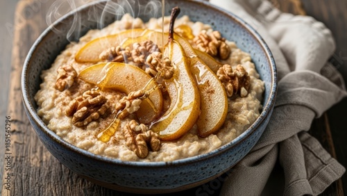 Delicious Oatmeal Bowl Topped with Caramelized Pears and Walnuts.