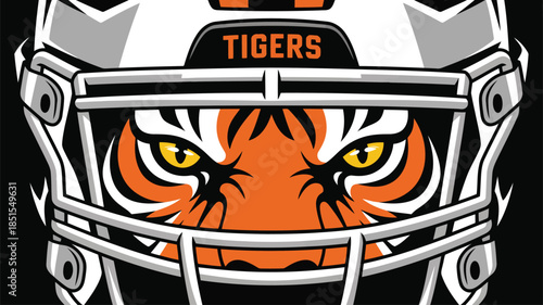 Close up of an American football helmet featuring the word TIGERS and fierce animal eyes