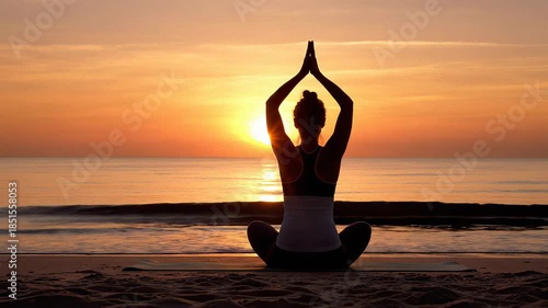 Woman Practicing Yoga on Beach at Sunset.
