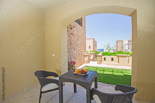 Wallpaper Mural Terrace furniture of a luxury apartment in tropical resort with furniture and sea view over garden from balcony Torontodigital.ca