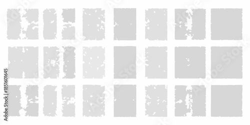 A grid of twenty one distressed rectangular gray and white textured blocks