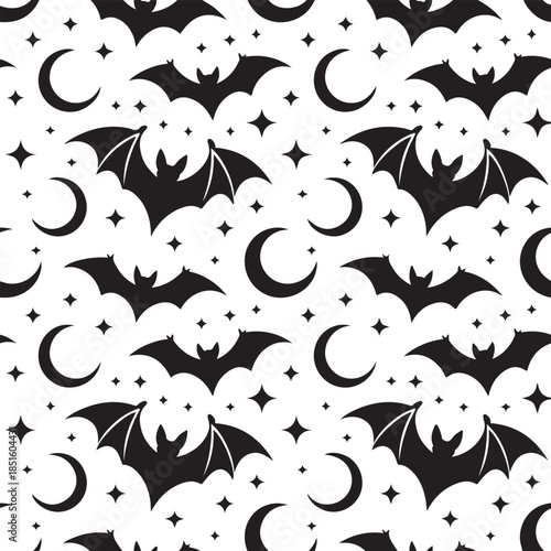 Halloween themed seamless pattern with bats moons and stars