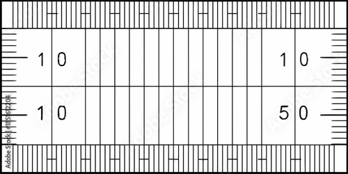 A black and white image depicting a ruler with markings and measurements