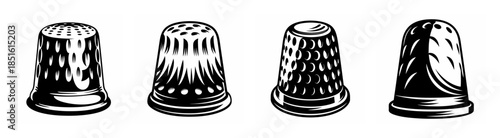 Four vintage thimbles displaying detailed textures and embossed patterns for sewing and crafting