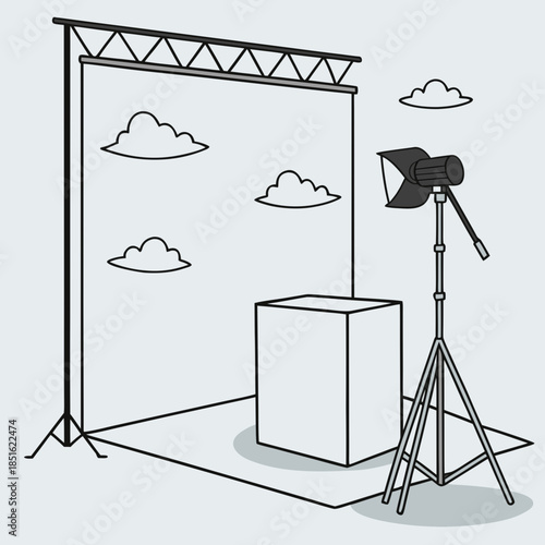 Professional photo studio setup with backdrop lighting and prop.