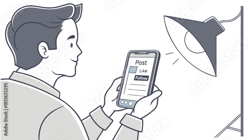 Man using smartphone to record video with professional lighting setup.