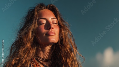 Wallpaper Mural Sunset moment with a woman enjoying the warm breeze on the beach with her eyes closed and a smile on her face Torontodigital.ca