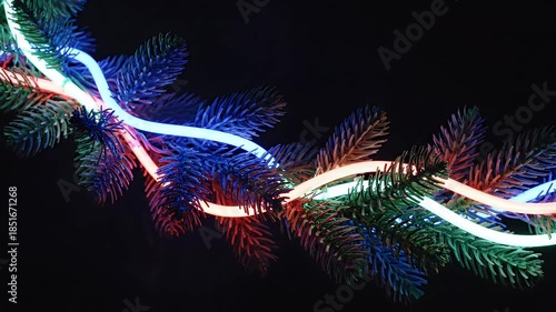 Wallpaper Mural Neon Christmas Garland Close-Up - A close-up shot of a Christmas garland adorned with colorful neon lights. Torontodigital.ca