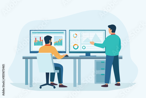 Data analysis in progress two professionals collaborating at their workspace