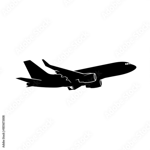 Black silhouette of a commercial airplane flying