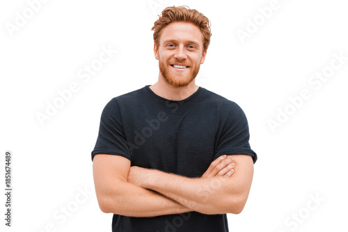 Wallpaper Mural Broad-smiling man with crossed arms stands against a plain background in a casual shirt Torontodigital.ca