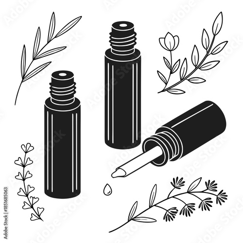 Essential oil bottles with herbs