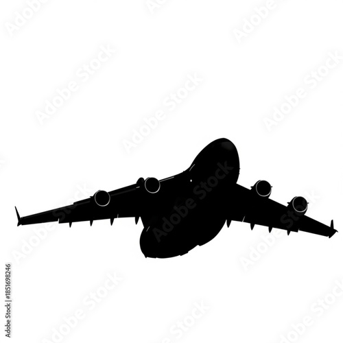 Silhouette of a large commercial airplane flying with wings spread