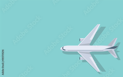 A white airplane flying in the sky with a light blue background