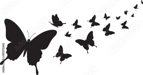 Silhouette of a large butterfly leading a flock of smaller butterflies in flight, representing transformation and freedom