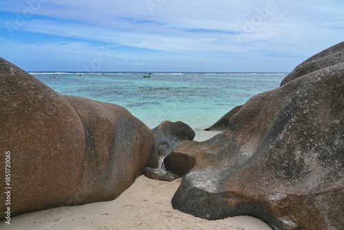 Day view of the Anse Source d Argent beach with its granite boulders on La Digue island in the Seychelles, one of the most beautiful beaches in the world