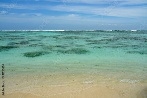 Day view of the Anse Source d Argent beach with its granite boulders on La Digue island in the Seychelles, one of the most beautiful beaches in the world