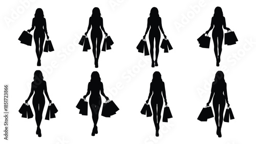 Silhouette of stylish women walking with multiple shopping bags