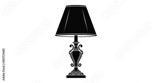 Elegant black table lamp with ornate detailing a striking visual silhouette