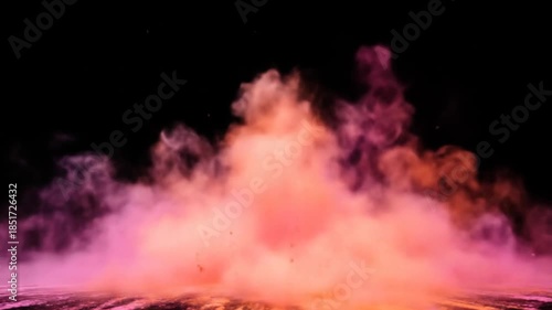 Abstract explosion of colorful powder on black background