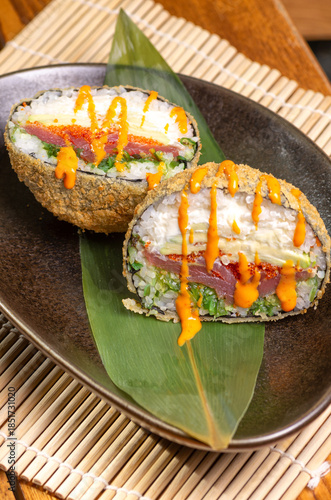 Crispy sushi burger with spicy tuna filling Japanese sushi burger with tuna and rice Fried sushi burger with spicy tuna