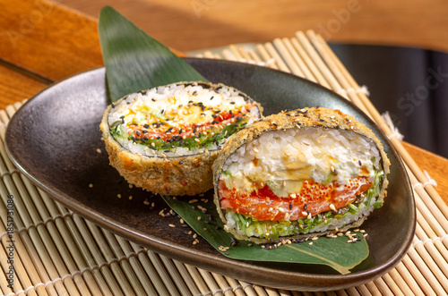 Crispy sushi burger with spicy Salmon filling Japanese sushi burger with Salmon and rice Fried sushi burger with spicy Salmon
