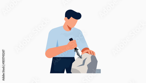 Person carefully chiseling a rock with a tool