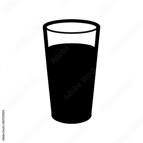 A glass of dark liquid