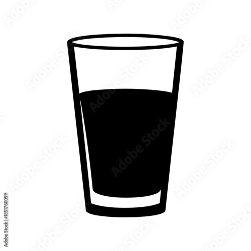 Half-filled glass of dark liquid