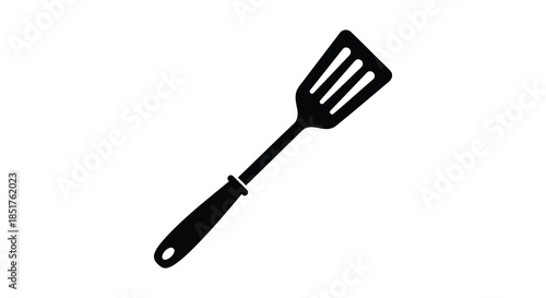 A simple black kitchen spatula illustration against a white background a striking silhouette