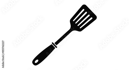 Simple black kitchen spatula illustration against a white background a striking silhouette