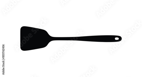 Simple black spatula isolated on white background a minimalist kitchen utensil silhouette