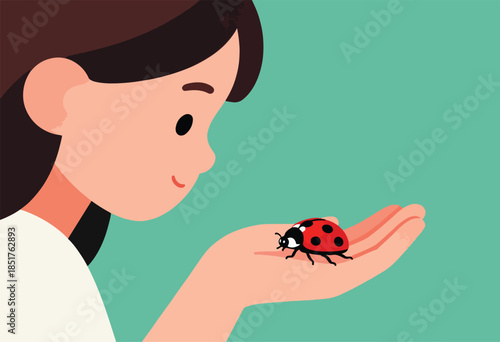 Person gently holding a ladybug on their palm