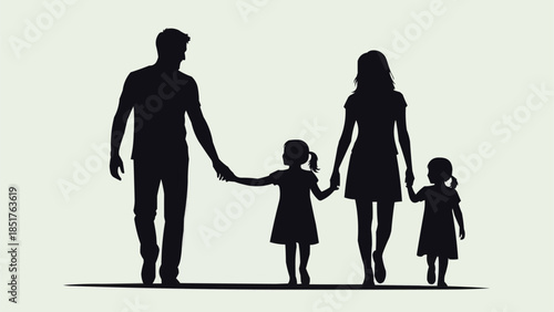 Silhouette of a family walking together holding hands.