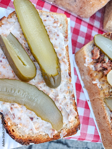 Wallpaper Mural "Pajda ze smalcem" is a traditional Polish sandwich with thick slice of hearty bread, spread with a savory spread made of rendered pork fat. Served with pickled cucumbers Torontodigital.ca