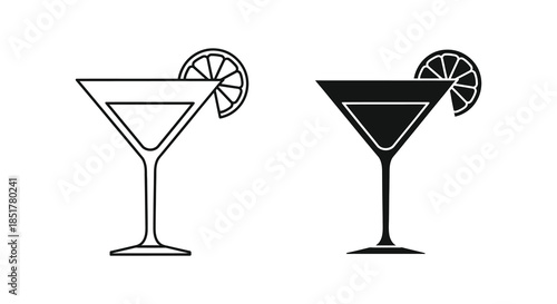 Two martini glasses with lemon slices one in a striking black silhouette
