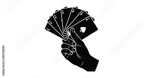 A hand fanning out playing cards in a stark dramatic black silhouette