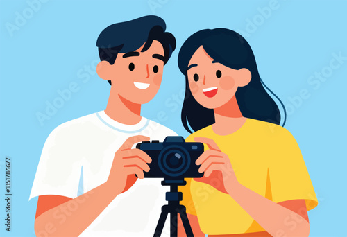 Couple smiles holding camera on tripod, capturing a moment