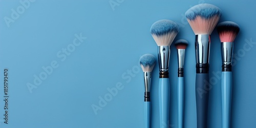 Makeup Brushes on Blue Background for Beauty and Cosmetics